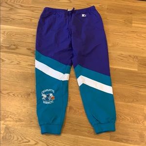 Starter Charlotte Hornets warm up pants.